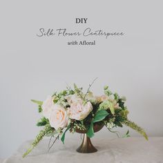 DIY silk flower centerpiece Diy Centerpieces Cheap, Faux Flower Wedding, Diy Wedding Bouquet Fake Flowers, Fake Flower Centerpieces, Wedding Bouquet Fake Flowers, Diy Wedding Centerpiece, Cheap Centerpieces, Cheap Wedding Bouquets, Silk Flower Centerpieces