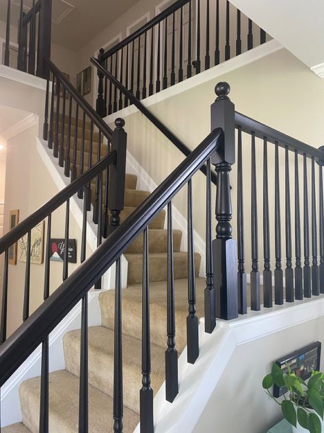 I used Varathane Poly + Stain to transform my staircase Banister Spindles Ideas, Painting Stair Railings, Stairway Update, Orange Staircase, Black Painted Stairs, Painted Stair Railings, Black Stair Railing, Redo Stairs, Stair Railing Makeover