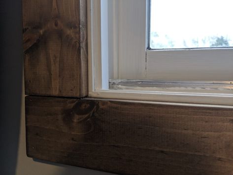 How To Trim A Window Inside, Easy Farmhouse Window Trim, Diy Farmhouse Window Trim, Wood Stain Window Trim, Diy Interior Window Trim, Stained Window Trim, Stained Trim Interior, Wood Trim Windows, Rustic Window Trim