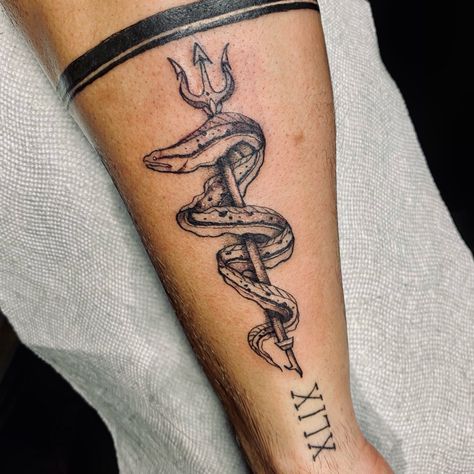 mens eel trident forearm tattoo Poseidon Themed Tattoo, Trident Forearm Tattoo, Eel Tattoo Design, Ocean Forearm Tattoo, Sea Serpent Tattoo, Trident Tattoo For Men, Eel Tattoo, Ocean Tattoos Men, Trident Tattoo