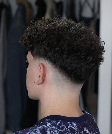 #menshair #barber #barbershop #barberlife #haircut #barbershopconnect #fade #hair #mensfashion #hairstyle #barbers #barbering  #hairstyles #style #barbersinctv #menstyle #barberworld #andis #skinfade #fashion #menshaircut #sharpfade #mensgrooming #haircutsformen Mid Fade Haircut Curly Hair, Curly Hair Low Fade Men, Low Drop Taper Fade, Mid Fade With Curly Hair, Low Mid Fade Curly Hair, Drop Fade Wavy Hair, Low Fade Cabelo Ondulado, Mid Fade Textured Top, Low Taper Fade Fluffy Hair