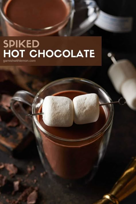 There's no better way to warm up on a chilly night than a mug of this decadent Spiked Hot Chocolate. Smooth, creamy and not too sweet, this hot chocolate with alcohol is better than any powdered cocoa mix and just as easy to make with only six ingredients! Hot Chocolate With Alcohol, Chocolate With Alcohol, Alcoholic Hot Chocolate, Spiked Hot Chocolate Recipe, Batch Cocktail Recipes, Spiked Hot Cocoa, Alcohol Chocolate, Batch Cocktail Recipe, Spiked Hot Chocolate