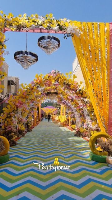 Haldi Venue Decor, Haldi Decor Poolside, Colorful Haldi Decor, Haldi Passage Decor, Props For Haldi Ceremony, Engagement Entrance Decor, Indoor Haldi Decor Ideas, Haldi Entrance Decor, Wedding Haldi Decoration