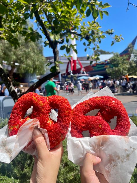 Disneyland Pretzel Covered in Hot Cheetos Hot Cheetos And Cream Cheese, Hot Cheeto Food Ideas, Hot Cheeto Recipes Snacks, Hot Cheetos Aesthetic, Hot Cheeto Mozzarella Sticks, Cheddar Cheese Dip, Flaming Hot Cheetos, Best Disneyland Food, Hot Cheetos