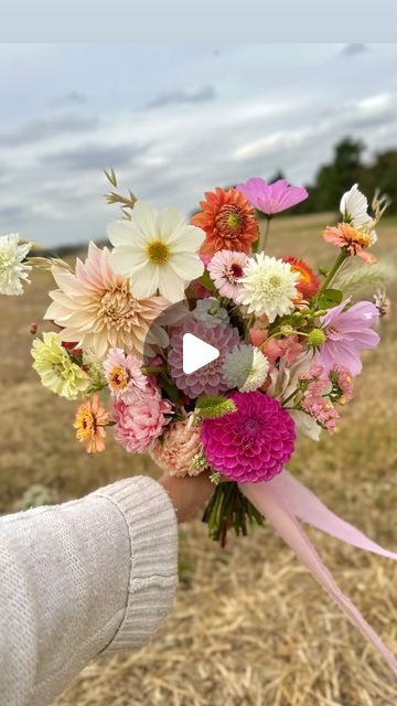 Elly - Wedding Florist, East of England on Instagram: "For Shell 🌸 think woodland wedding, festival vibes, sequins and tipis. What an awesome brief this bouquet was. When Dahlias and cosmos are in full swing I am very happy!

All British grown from the farm @hawksburyhuntflowers 

#britishgrownflowers #britishflowers #festivalwedding #colourfulweddingflowers #brightweddingflowers #gardenweddingideas" Dahlias Wedding, Bright Wedding Flowers, Colorful Wedding Flowers, British Flowers, White Bridal Bouquet, Festival Vibes, Woodland Wedding, Festival Wedding, White Bridal