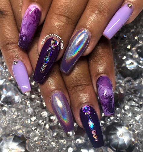 Poppin Purple Swirlies & Glam 💎💜😈🔮 using @fetishfornails_nailstore glossy top coat 💅🏽 GET BEJAZZELED 💜💜💜💜 #atlanta #atlantanails… Purple Gel Manicure Ideas, Purple Almond Nail Ideas, Purple Bday Nails, Purple Foil Nails, Purple Almond Nails, Purple Fall Nails, Pointy Purple Nails, Dark Purple Glam Nails, Sharp Purple Nails