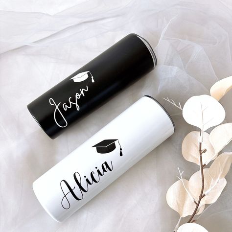 Looking for a special way to congratulate the graduating class of 2024? We got you covered! New this year is our grad themed personalized tumblers along with our classic graduation box! Both can be personalized with a name, available in all tumbler colours and most gift boxes. Congratulations to all the graduates this year 🎓🎉 Graduation Hat Designs, Graduation Box, Tumbler Bottle, Phd Graduation Gifts, Phd Graduation, College Gifts, Personalized Graduation Gifts, Class Of 2024, Grad Gifts