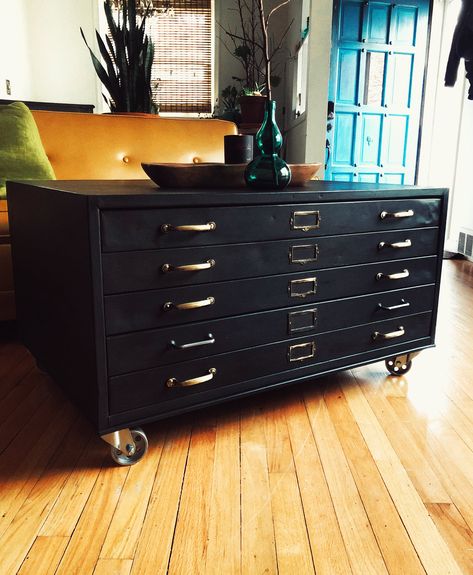 "This flat file is sold, let me find one for you and customize to your specs!!  Black Vintage architect's flat file cabinet repurposed for use as a coffee table, 1960's. 4 drawers, top drawer is a double large drawer. Solid brass handles. Rolling caster wheels. 40\" wide 28\" deep 21\" tall Shipping is not included with this item. Shipping is not 500.00 will change price after agreeing on quote for shipping. Please contact with zip code for shipping quote. Or pickup in person available also." Blueprint Table, Rustic China Cabinet, Map Cabinet, Flat File Cabinet, Printmaking Studio, Flat File, Flat Files, Coffee Table Black, Black Industrial