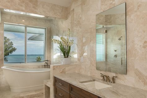 Taj Mahal Quartzite project using stone slabs by Primstones®, the Premier Stone Provider in South Florida with locations in Miami and West Palm Beach. #tajmahal #tajmahalquartzite #bathroom #bathroomdecor #naturalstonecountertop #naturalstoneflooring #naturalstone #bathroominspiration #interiordesign Taj Mahal Quartzite Bathroom, Taj Mahal Bathroom, Quartzite Bathroom, Taj Mahal Quartzite Countertops, Best Countertops, Quartz Bathroom, Taj Mahal Quartzite, Quartz Marble, Natural Stone Countertops