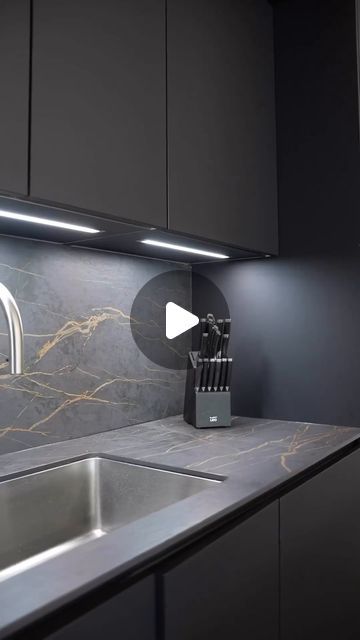 Dekton By Cosentino on Instagram: "A truly cohesive design has been created by @hepkitchens incorporating the dramatic, deep, and alluring shade of Dekton Laurent with its veins of gold into this bold kitchen design.   The island panelling and the sleek, handless cabinets perfectly complement the overall sophisticated look. — www.cosentino.com/dekton — #DektonbyCosentino #CarbonNeutral #BeautyIsDekton #CosentinoDesign #Architecture #Art #Kitchen" Handless Cabinets, Dekton Kitchen, Dekton Laurent, Bold Kitchen, Art Kitchen, Architecture Art, Instagram A, Kitchen Design, Kitchens