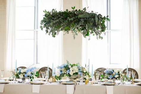 Greenery Chandelier over a Blue and Gold Tablescape | Deborah Zoe Photography on @limnandlovely via @aislesociety Takken Decor, Greenery Wedding Decor, Floral Wedding Decorations, Rustic Wedding Decorations, Flower Chandelier, White And Blue Flowers, Floral Chandelier, Hanging Flowers, Deco Floral