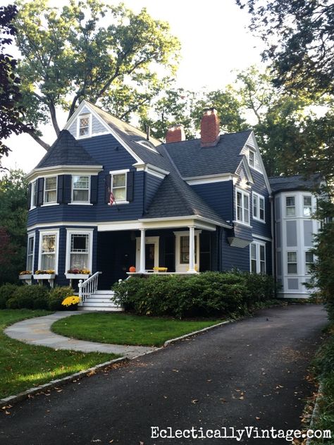 Fall Curb Appeal - 18 stunning homes with ideas to copy. Love this blue house and the window boxes filled with colorful mums eclecticallyvintage.com House Exterior Colors Blue, Fall Curb Appeal, Dark Blue House Exterior, Dark Blue Houses, Grey Exterior House Colors, Best Exterior Paint, Stunning Homes, Blue Exterior, House Trim