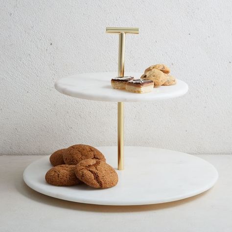 A brass and marble serving stand that'll let them host a tea party the Queen of England would approve of — tiny finger sandwiches and all. 2 Tier Cake Stand, 2 Tier Cake, Kitchen Utensil Holder, Dessert Stand, Tier Cake, Tiered Stand, Cake Display, Kitchen Marble, Tiered Trays