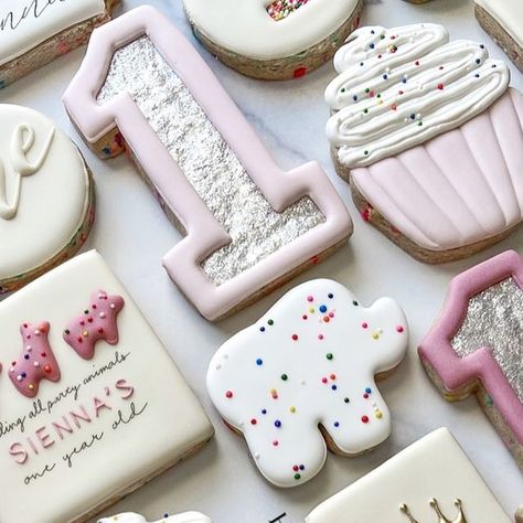 Jessica on Instagram: "🎀🐪 🦍 🐘 For those who guessed animal crackers as the theme in my last post, nice job! Someone guessed gum-ball theme, and now I can’t wait for a gum-ball order! Some of these designs would be so cute to recreate for that!🍬

These cookies were just so playful and fun to make for a precious little one’s first birthday celebration- and the client’s request for funfetti flavor was the perfect touch 🥳
.
.
.
.
.
.
.
.
.
#birthdaycookies #cookieart #customcookies #sugarcookies #sugarcookiesofinstagram #animalcrackercookies #decoratedsugarcookies #decoratedcookies #cookiedecorating #cookier #cookiedecorator #royalicing #royalicingcookies #sprinklecookies #cookiesofinstagram #icedcookies #ctcookies #fairfieldct #fairfieldcounty #trumbullct #stratfordct #animalcrackets #f Animal Cookie Birthday Party, First Birthday Cookies Girl, Fun To Be One Birthday, Baby Shower Cakes Neutral, Cookie Birthday Party, First Birthday Cookies, Animal Cookie, Baby Birthday Themes, First Birthday Party Themes