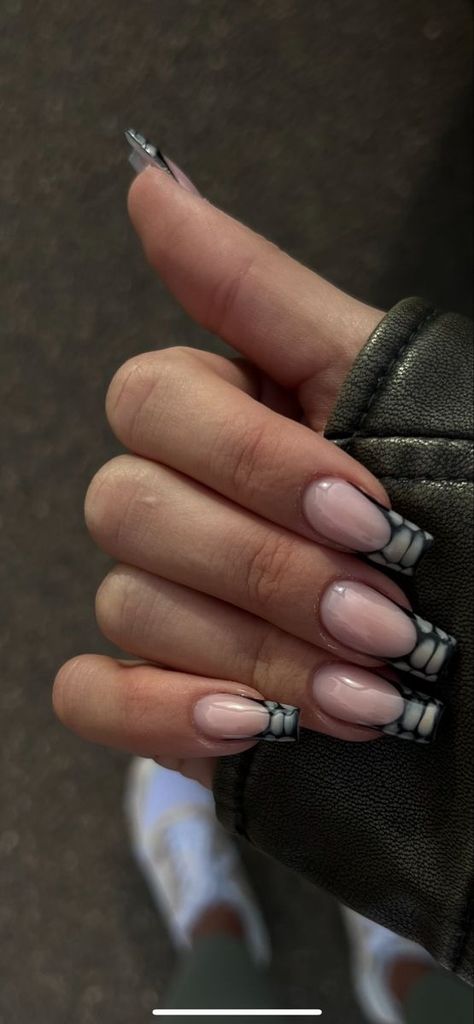 The french tip nail aka french manicure is getting a makeover in 2024. We got the latest viral nail designs that are trending all over tiktok and beyond. #nails #nail Follow us for the latest 2024 nail ideas and nail inspo! Square Nail Designs Black And White, Black White Nails Designs Classy, Reptile French Tip Nails, Nails Inspiration Long Square, Funky Black Nails, Black Croc Nails, Square Nail Designs Winter, Square Acrylic Nails Winter, Croc Nail Design