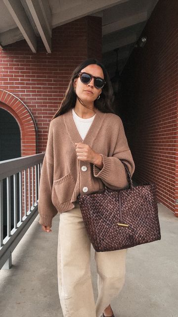 Natalie Borton on Instagram: "Wearing shades of brown on this gloomy June day in San Diego ☁️☁️☁️ Where do you live, and what’s the weather like for you right now?!   〰️ @babaa sweater 〰️ @citizensofhumanity jeans 〰️ @littleliffner bag 〰️ @fredasalvador ballet flats 〰️ @nataliebortondesigns hoops & sunnies 〰️ Cream tank is coming soon!  Like the look? Save it for later when you need an outfit idea 🤎✨" Babaa Sweater, Platform Mules Outfit, Brown Sweater Outfit, San Diego Outfits, June Days, Natalie Borton, Wearing Shades, Mules Outfit, Platform Mules