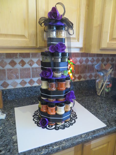 I made this for my future daughter- in- law's Bridal Shower. I could not find kitchen towels i liked to make a towel cake so i decided to use spices. for a spice cake! Dollar Store Diy Christmas, Housewarming Ideas, Kitchen Basket, Towel Cake, Towel Cakes, Gift Towers, Pear Cake, Diy Gift Baskets, 100 Dollar