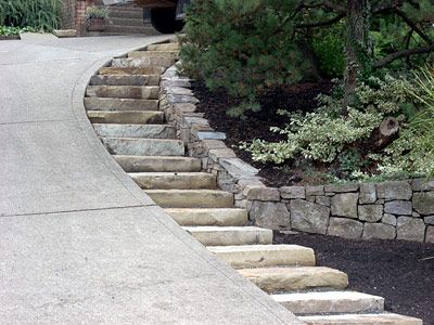 Single Stone Steps by Steep Driveway-my property is so badly in need of this solution! Steps Next To Driveway, Sloped Driveway, Steep Driveway, Patio Step, Steep Gardens, Stone Steps, Driveway Design, Driveway Landscaping, Garden Stairs