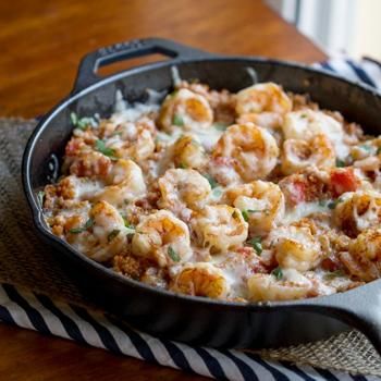 Cajun Shrimp and Quinoa Casserole - Great, quick and easy.   Used one can of tomato puree and two fresh tomatoes - worked great and no need for paste then.  Feta was really good on top. Emeril creole seasoning recipe.  Squeeze of lemon at the end with the cilantro.  Great with salad and a dinner roll. Shrimp And Quinoa, Quinoa Casserole, Skillet Dinner Recipes, Cooked Quinoa, Iron Skillet Recipes, Fontina Cheese, Seasoning Salt, Skillet Recipes, Cast Iron Skillet Recipes