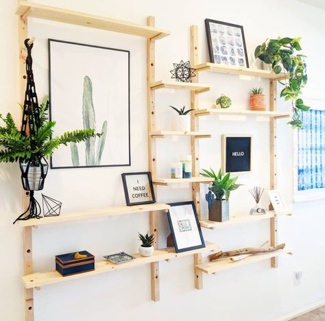 DIY adjustable wall shelf (inspired by giant peg board) Peg Board Shelving, Adjustable Shelving Wall, Peg Board Shelf, Peg Wall Display, Peg Shelves, Giant Pegboard Wall, Adjustable Wall Shelving, Peg Board Shelves, Peg Board Walls