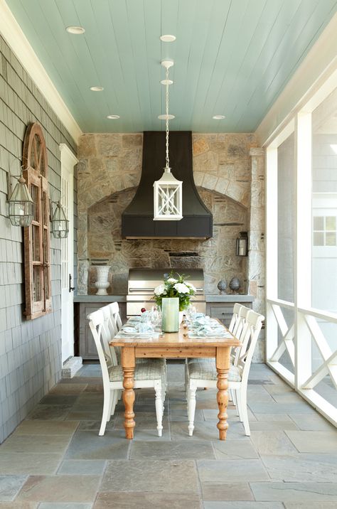 Screened in outdoor kitchen with bluestone floor tiles and blue painted ceiling. Ceiling paint color is Benjamin Moore Silver Mist. Paint color is Benjamin Moore Silver Mist. #outdoors #kitchen #blueceiling #paintcolor #BenjaminMooreSilverMist Paint color is Benjamin Moore Silver Mist T.S. Adams Studio. Interiors by Mary McWilliams from Mary Mac & Co. Veranda Design, Ceiling Paint Colors, Screened Porch Decorating, Porch Design Ideas, Screened Porch Designs, Building A Porch, Blue Ceilings, Screen Porch, Have Inspiration