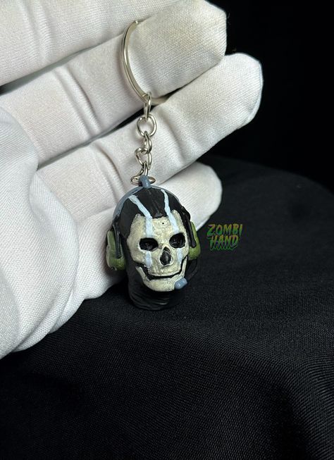 Don't forget to visit our MW2 Soap Skull mask in our store !! Unleash the ultimate intergalactic battle on your keys with our stunning MW2 Ghost Mask Keychain! This handcrafted masterpiece is a must-have for any Call of Duty Warzone enthusiast, dedicated collector, or lover of iconic cinematic clashes. 🌌 Impeccable Design: Step into the thrilling world of Call of Duty: Warzone with this meticulously crafted Ghost mask keychain! Inspired by the iconic character from the game, this miniature replica encapsulates the essence of stealth, bravery, and tactical prowess. 🔑 Built to Last: Crafted from durable, high-quality materials, this keychain is not only a work of art but also a practical and long-lasting accessory. It's built to withstand the rigors of everyday use, ensuring your favorite Mw2 Soap, Tactical Keychain, Mw2 Ghost, Ghost Mask, Call Of Duty Warzone, Ghost Skull, Call Off Duty, Call Of Duty Ghosts, Skull Mask