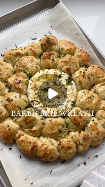 Nicolle | Cheese, Wine, Easy Appetizers & Recipes on Instagram: "RECIPE HERE ✨⬇️ Welcome to baked brie WEEK day one, we are making my classic garlic butter baked brie but in a crispy herby edible wreath 🧀🤤🎄 and follow along for a weeks worth of baked brie recipes to come! What you’ll need: 🧀 8oz brie cheese wheel 🧀 5 tbsp melted butter 🧀 garlic (2-3 cloves chopped finely) 🧀 pizza dough 🧀 one egg (egg wash) 🧀 fresh parsley & rosemary (chopped finely) Heat oven to 425. On a sheet pan, lined with parchment paper, add your brie cheese in the middle. Score the top of your brie. Roll your pizza dough into small balls and add them around your brie cheese forming a wreath. The dough balls should be touching one another. Brush only your pizza dough balls with a bit of egg wash. Add half yo Pizza Dough Balls Appetizers, Pizza Dough Balls, Edible Wreath, Baked Brie Recipes, Egg Egg, Cheese Wheel, Cheese Wine, Brie Recipes, One Egg