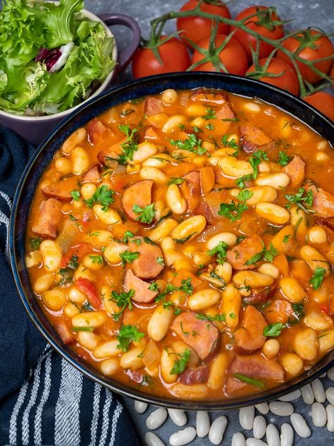 a plate of kielbasa bean stew Kielbasa Stew Recipes, Beans And Kielbasa Recipe, Kielbasa And Beans, Sausage Bean Soup, Easy Stew Recipes, Kielbasa Soup, 15 Bean Soup, Sausage Stew, Kielbasa Recipes