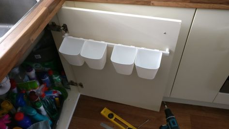 This kitchen door storage costs only $5.15 - IKEA Hackers - (dishwasher pods?) Kitchen Door Storage, Kitchen Storage Bench, Small Apartment Storage, Dishwasher Pods, Ikea Kitchen Island, Small Apartment Bedrooms, Apartment Storage, Kitchen Island Ikea Hack, Ikea Kids