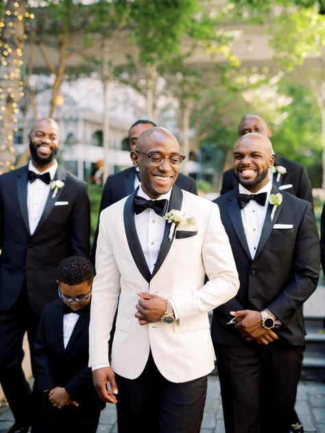 Black Man Wedding Outfit, Cream Jacket Black Pants Groom, Cream And Black Groom Suit, Black And White Suit For Men Wedding, White And Black Groom Suit, Black Tie Groomsmen Attire, Black And White Suit For Men, Black And White Tuxedo Wedding, Black Men Wedding Suits