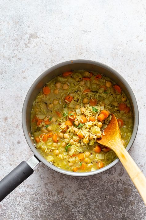 Comforting and Healing Vegan Chickpea Rice Soup with Veggies. A glutenfree variation of Vegan Chicken Noodle Soup. Easy 1 Pot 30 minute meal. #vegan #veganricha #Glutenfree #Nutfree #Recipe #Soyfreeoption Brothy Soup, Soup With Veggies, Veggies Soup, Chickpea Rice, Vegan Chicken Noodle Soup, Chicken Noodle Soup Easy, Vegetarian Nutrition, Store Cupboard, Vegan Richa