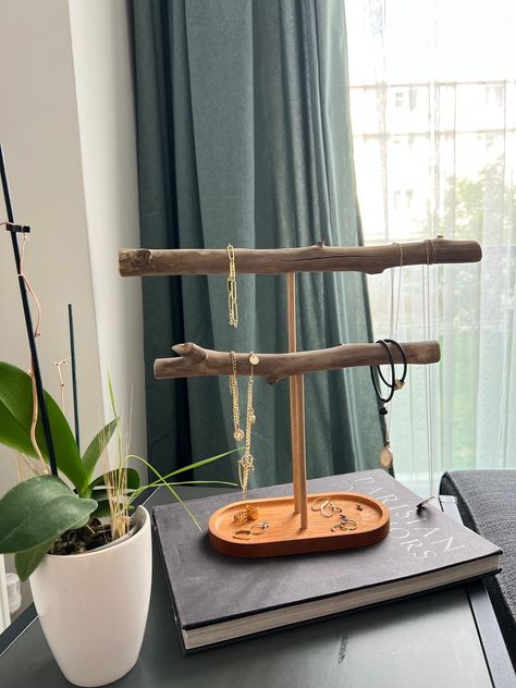 You have many options for storing your Jewelry. However, the most remarkable and natural among them is the driftwood jewelry and watch stand. A Driftwood Jewelry Stand is a jewelry stand made from pieces of wood by the sea that wear out over time. This stand allows you to display your jewelry and reach them easily. Also, driftwood pieces, each unique, add a rustic and bohemian vibe to your home. Wood Jewelry Organizer is not only practical, but also decorative. This stand, which you can put in a Homemade Jewelry Holder, Boho Jewelry Stand, Driftwood Jewelry Display, Rustic Jewelry Organizer, Wooden Jewelry Stand, Rustic Jewelry Display, Wood Jewelry Diy, Jewelry Booth, Homemade Necklaces