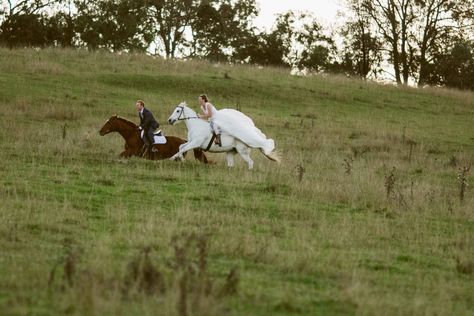 Bride and Groom galloping on Horses.  Gorgeous country wedding location near Sydney, NSW. http://www.chapmanvalleyhorseriding.com/australian-country-horseback-wedding/   White horse. Horseback wedding. Romantic wedding. Outdoor wedding. Unique wedding. Wedding Ideas. Wedding On Horseback, Horse Wedding Photos Beach, White Horse Engagement Photos, Bride Riding Horse, Horses Wedding Photography, Wedding Entrance On Horse, Weddings With Horses, Horse Riding Wedding, Wedding Ideas Horses