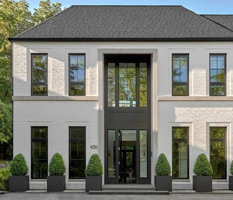 European inspired home with a dramatic black and white palette in Illinois Colonial Chic, Classic House Exterior, European House, Brick Facade, Doors And Windows, White Brick, Dream House Exterior, Brick House, Classic House