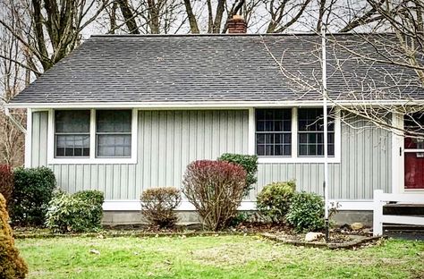 Georgia Pacific board and batten siding color Thistle on a ranch style home. Board And Batten Siding Ranch Home, Ranch House Remodel Interior, Board And Batton Siding, Vinyl Siding Ideas, Chicago Ideas, Shaker Siding, Exterior House Siding, Ranch House Remodel, Siding Ideas