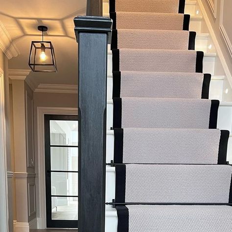 Jodie Smith | Home Interiors on Instagram: "• S t a i r R u n n e r Q u e s t i o n s • I’ve had a lot of stair runner related questions recently so I thought it would be easier to post the details here. As we bought a bungalow, our house originally had no upstairs. We had these stairs made by @tkstairs and my hubby installed them. The stair runner is Wembley Arena Autumn carpet and I had the edges whipped in a black herringbone fabric (most carpet shops will allow you do this for an additional cost). We bought our carpet from a local store. The handrail is painted in @farrowandball estate eggshell in the colour ‘Pitch Black’. The little spotlights are actually decking lights from @screwfix_uk which our electrician installed during the build process. Black stair rods are from @s Black And White Stairs With Runner, Black Stairs With Runner, Chevron Panelling, Jodie Smith, Stair Runner Rods, Decking Lights, Black Banister, White Banister, Black And White Stairs