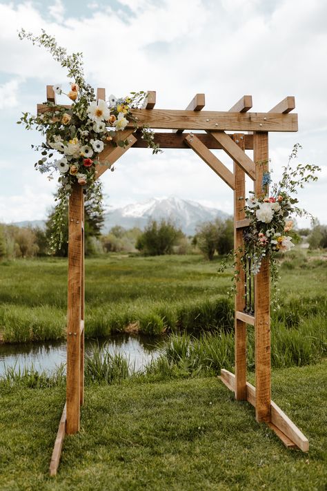 Boulder Blooms - Airy and Whispy Carbondale Valley Wedding Outdoor Arbor Wedding, Wood Archway Wedding, Rectangular Wedding Arch Flowers, Simple Arbour Flowers, Flower Trellis Wedding, Wedding Arch Arbor, Wedding Arbor Wildflowers, Flower Arbour Wedding, Wild Flower Wedding Arbor