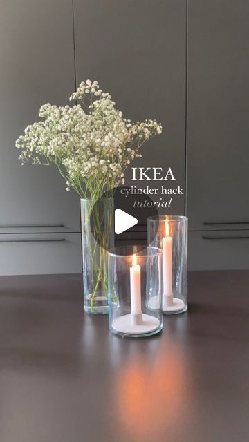 Mina on Instagram: "@home.by.mi made this IKEA Cylinder hack  Aesthetically pleasing but also functional ✨  The base prevents the vase to get wax on it so you can switch it out anytime you want without having to clean it first.  Love to know what you think 🤍 More @home.by.mi   You can find a step-by-step tutorial on the thornior.com blog ✨  #diy #interiordesign #hack #ikeahack #ikea #candle #thornior" Ikea Candle Hack, Candles And Flowers Centerpieces, Cylinder Vase Decor, Cylinder Vase Ideas, Ikea Vase, Ikea Candles, Candle Hack, Ikea Vases, Ikea Inspiration