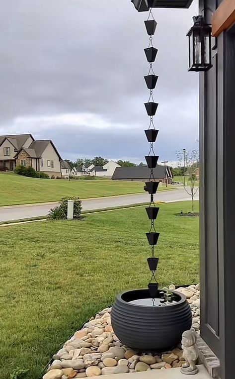 Rain Chain Ideas Landscapes, Gutter Rock Drainage, Rain Spout Downspout Ideas, Rain Downspout Ideas, Rain Chains Gutter Downspout Ideas, Rain Chain Basin Ideas, Rainchain Ideas, Rain Gutter Drainage Ideas, Modern Rain Chains