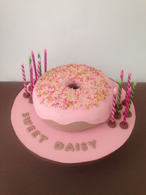 Pink donut cake with sprinkles. Pink Donut Cake, Donut First Birthday, Cake With Sprinkles, Donut Cake, Pink Desserts, Pink Donut, Sprinkle Cake, Pink Donuts, First Birthday Cake