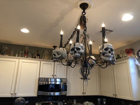 Skeleton Chandelier for the Kitchen Shipwreck Halloween, Skeleton Chandelier, Skeleton Kitchen, Skull Chandelier, Halloween Decorating Ideas, Creative Halloween Decorations, Skeleton Decor, Halloween Decorations To Make, Halloween Kitchen Decor