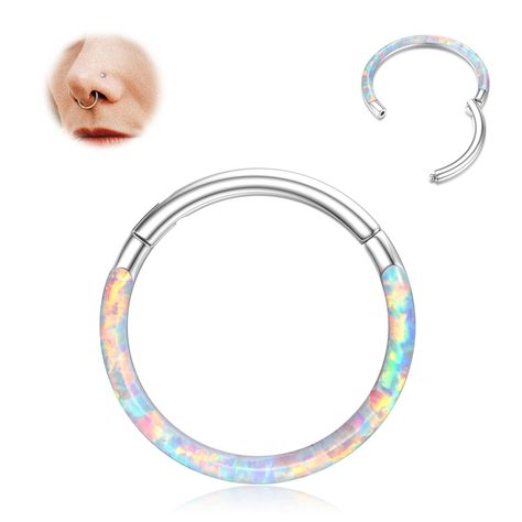 PRICES MAY VARY. Hinged Opal Septum Ring: One order includes 1pc of hinged white opal segment ring. Wire Thickness: 18G(1.0mm); Inner Diameter: 8mm(0.31 inches); Wire Color: Silver. Material: Genuine 316L stainless steel. Please refer to our size chart for selecting the appropriate size. Reach out to us any time if you have any questions regarding the nose piercing. Front-set Iridescent white Opal: Our Septum Jewelry is embedded with boldly front-set white opal,a beacon of iridescent beauty, add Opal Septum Ring, Septum Jewellery, 18g Nose Ring, Hoop Nose Rings, Opal Septum, Conch Piercing Jewelry, Daith Piercing Jewelry, Opal Nose Ring, Septum Rings