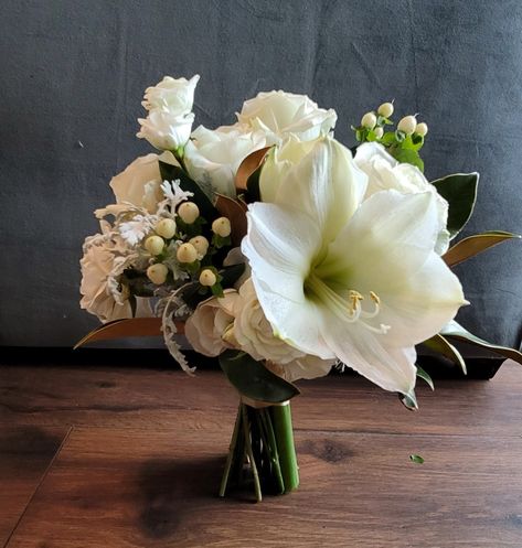 Winter bridesmaids bouquet. #winterbouquets #amaryllis White Amaryllis Arrangement, Amaryllis Bouquet, Amaryllis Arrangement, Amaryllis Christmas, White Amaryllis, Winter Bridesmaids, Bridesmaids Bouquet, Christmas Bouquet, Winter Bouquet