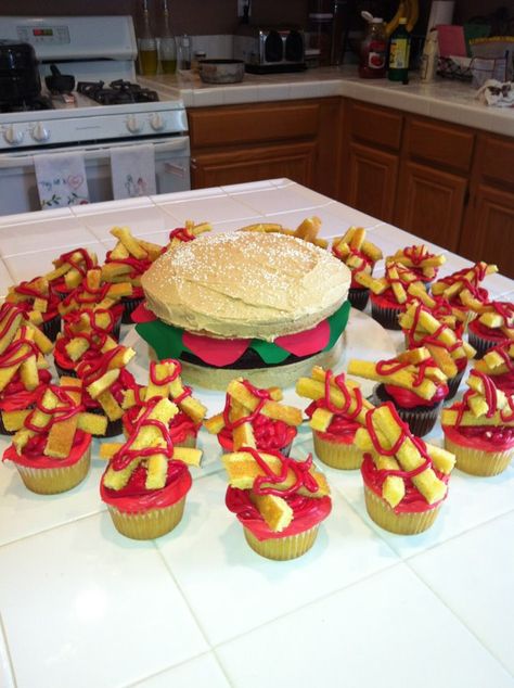 For my oldest son's birthday which always falls on Memorial Weekend-Hamburger cake with peanut butter frosting, brownie patty, and french fry cupcakes with ketchup! Hamburger Birthday Party, Burger Birthday, Hamburger Party, Burger Cupcakes, Mountain Wedding Cake, Cake With Peanut Butter Frosting, Hamburger Cake, Son's Birthday, Small Fry