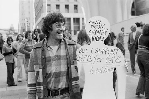 An old photograph from a gay rights protest in which a man holds a cardboard cutout representing his boyfriend, who was unable to attend the protest but still wanted to show his support. #gayhistory #mardigras #lgbt #gay Gay Rights Movement, Gay History, Lgbt History, Gay Rights, Media Bias, Lgbt Rights, Cardboard Cutout, Mardi Gras, A Man