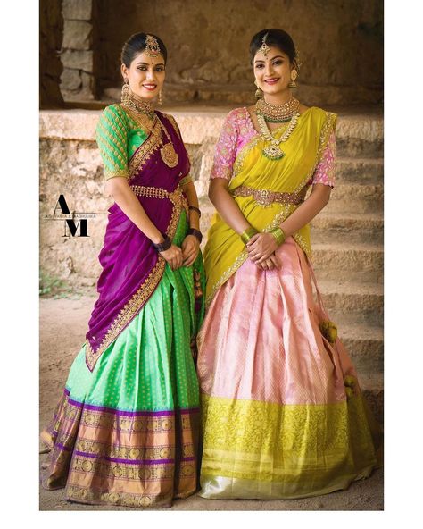 Aishwarya & Madhumika on Instagram: “"AADHYA" 2021 - collection An Emerald Green gadwal pattu Lehanga ensembled with heavy embroidered blouse, paired with a classic purple…” Pattu Langa Voni Half Saree, Purple Half Saree, Langa Voni Half Saree, Pattu Lehenga, Traditional Lehenga, Green Sari, Langa Voni, Designer Anarkali Dresses, Lehenga Saree Design