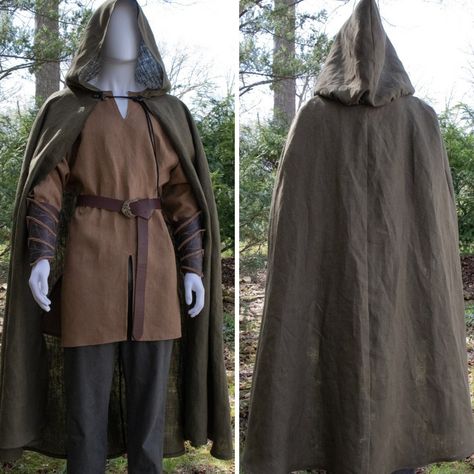 Join the FOTW Realm and get an instant 10% off code! http://eepurl.com/hrobtv High Elven Man - This noble 4 piece set was designed for a Lord of the Woodland Realm.  Set includes 100% linen long tunic with rider slits, high elven style leather bracers and leather belt with detailed Celtic knot buckle. ~ Size info: L (fits chest sizes up to 45").  XL (fits up to 52"). ~ Lots of color options, create your custom version of this outfit at checkout! ~ Items not included: Pants ~ ~ ~ ~ ~ ~ ~ ~ ~ ~ ~ Medieval Clothing Men, Elven Style, Woodland Realm, Medieval Cloak, Ren Faire Outfits, Ren Faire Costume, Elf Cosplay, Medieval Garb, Leather Bracers