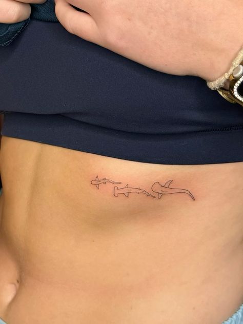 Shark Finger Tattoo, Cute Tramp Stamp Tattoos Simple, Dainty Shark Tattoo, Small Ocean Themed Tattoos, Beach Spine Tattoo, Sea Creatures Tattoo, Shark Teeth Tattoo, Fishing Rod Tattoo, Hammerhead Tattoo