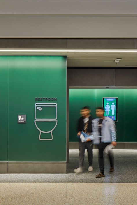 Signage and wayfinding at Kansas City International Airport in Kansas City, Missouri. Photo: Lucas Blair Simpson © SOM Kansas City International Airport, Experiential Graphics, All Gender Restroom, Signage And Wayfinding, Experiential Design, Kansas City Missouri, Experiential, International Airport, Missouri