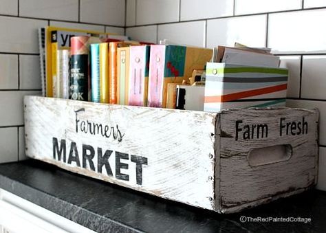 I wanted to make our cookbooks less cluttered looking on our kitchen counter.  Come see how to recreate this Farmers Market cookbook box.T[media_id:3032350][… Cookbook Display, Cookbook Storage, Diy Cookbook, Old Wooden Boxes, Painted Cottage, Ideas Para Organizar, Kitchen Crafts, Kitchen Design Decor, Book Storage